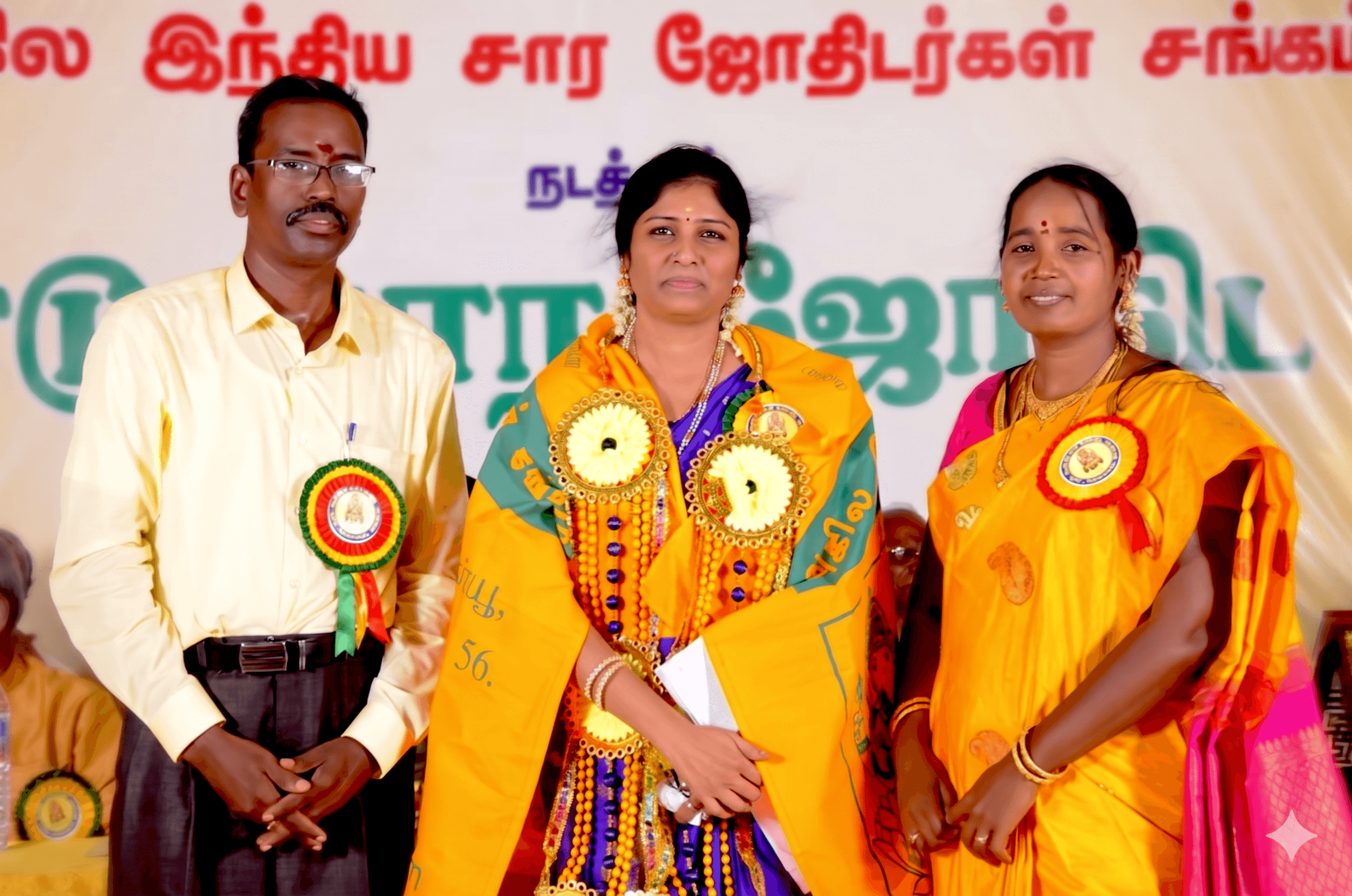 Vennila receiving certification from her guru, Astrologer Devaraj